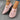 Women's navy blue breathable slip-on walking shoes made with lightweight mesh material, shown on feet.