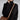 Image of a women's oversized black cashmere turtleneck knit sweater featuring long sleeves and a relaxed fit. The sweater covers the shoulders and neck, providing a cozy and elegant look.