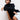 Women's oversized black turtleneck sweater with long sleeves, highlighting comfort and casual winter style.