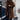 Women's oversized blue teddy coat, warm faux sheepskin winter jacket, shown in XL size, featuring a shoulder design, tartan pattern, long sleeves, and knee-length cut.