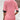 Woman wearing a pink cardigan over a white floral blouse, showcasing casual spring fashion.