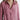Women's pink oversized long sleeve linen shirt with a casual and breathable design, featuring a visible shoulder and collar, with a lightweight texture and a hint of magenta.