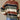 Women's multicolor striped crew neck sweater with long sleeves, styled with jeans, showcasing fall fashion knitwear.