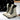 Women's stylish waterproof insulated fur-lined winter boots on a snowy surface.
