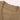 Women's tan cable knit sweater vest, sleeveless design with a V-neck style, displayed on a wooden floor background.
