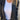 Women's tan suede blazer, lightweight and perfect for fall fashion, featuring long sleeves and a tailored fit, worn over a white dress shirt.