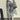 Women's trendy light wash boyfriend jeans with a casual relaxed fit, featuring a comfortable waist and thigh area, made from denim material.
