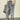 Women's light wash boyfriend jeans with a casual relaxed fit, highlighted by a focus on the thigh and knee areas, paired with a grey t-shirt.