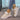 Women's turquoise fur-lined slip-on shoes with a stylish design, suitable for winter wear, shown against a neutral background.