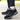 Women's waterproof insulated hiking boots in shades of white, black, and grey, designed for style and anti-slip performance. The boots are suitable for walking and sports activities, highlighting their functionality and comfort for outdoor adventures.