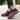 Women's waterproof insulated hiking boots in shades of grey, purple, and pink with anti-slip soles, designed for outdoor walking.