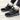 Women's waterproof insulated hiking boots in black and grey, featuring a stylish design with anti-slip soles, perfect for outdoor activities and walking.