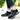 Women's waterproof insulated hiking boots in grey, featuring a stylish design and anti-slip soles, worn in a grassy outdoor setting.