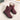 Women's waterproof insulated snow boots with a durable non-slip sole, featuring a stylish magenta and carmine color combination with synthetic rubber and leather materials, designed to keep feet warm and comfortable in cold conditions.
