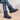 Women's waterproof insulated snow boots in electric blue, featuring a durable and non-slip sole. The boots are designed for thermal insulation, covering the leg up to the knee, providing warmth and traction in snowy conditions.