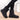 Women's waterproof insulated snow boots with non-slip soles, providing thermal protection and durability, shown on a model's legs.