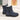 Women's grey waterproof insulated snow boots featuring a non-slip synthetic rubber sole, designed for comfort and durability in outdoor sportswear.