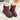 Women's waterproof insulated snow boots in a vibrant magenta color, featuring a durable and non-slip synthetic rubber sole, designed to provide thermal comfort and protection in snowy conditions.