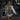 Women's white shearling vest being worn by a woman standing, showcasing the urban chic winter fashion with visible details like the soft fur texture and tailored fit around the shoulders and waist.