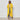 Women's oversized yellow cable knit cardigan sweater worn by a fashion model, showcasing the garment's cozy design with a focus on its long sleeves, collar, and waist.