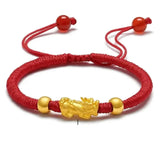 24K Gold Red String Bracelet with 3D Pixiu Beads and 999 Gold Stamp, featuring intricate beadwork and luxurious design.