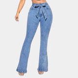 Flared bell bottom jeans in 70s vintage style, high-waisted with electric blue denim fabric, featuring a pocket and visible knee and thigh areas.