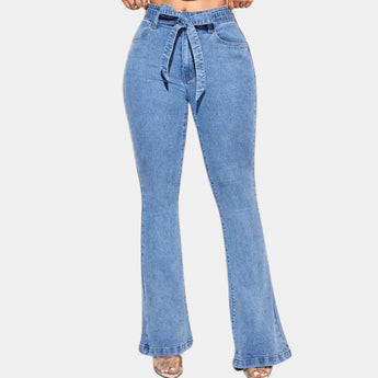 Blue high-waisted flared bell bottom jeans made from denim, featuring a vintage 70s style with pockets and electric blue color.