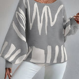 Abstract grey balloon sleeve sweater featuring a trendy design for women's fall knitwear, with focus on the puffed sleeves and neutral grey color.