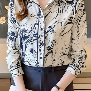 Abstract print beige and navy women's blouse with a swirl pattern, featuring long sleeves and a classic collar, suitable for office wear.