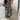 Abstract Print Plus Size V-Neck Summer Dress with Ruffle Hem in Nero1, featuring short sleeves and a flowing design for a stylish and comfortable fit.