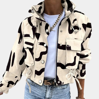 Black and white abstract print women's cropped jacket with a drawstring waist, featuring a collar and sleeves, displayed in apricot color and XL size.