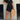 Acid wash denim mini dress featuring a collared neckline and short sleeves, styled in a trendy fashion. Model is wearing the dress in Nero color, size 3XL.
