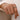 Adjustable minimalist two-tone silver gold ring worn on a hand, showcasing sleek modern jewelry design.