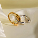 Adjustable minimalist two-tone silver and gold ring with a sleek modern design, suitable for engagement, wedding, or everyday wear.