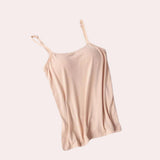Adjustable straps seamless skin tone camisole in a lightweight and breathable fabric, shown in the color naked, size XL. The camisole features a sleeveless design with a round neckline, ideal for layering or wearing alone as outerwear.
