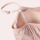 Adjustable straps seamless skin tone camisole featuring a lightweight and breathable design, sleeveless with a smooth neckline and fitted waist, shown on a model.