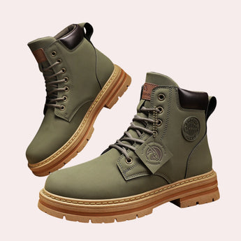 
A pair of Adriano Apex Men's Waterproof Tan Leather High-Top Work Boots in light green, size 47, displayed on a white background. The boots feature a rugged design suitable for outdoor work, with sturdy laces and a durable sole.