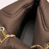 Men's waterproof tan leather high-top work boots, designed for durability and comfort, shown in an outdoor setting.