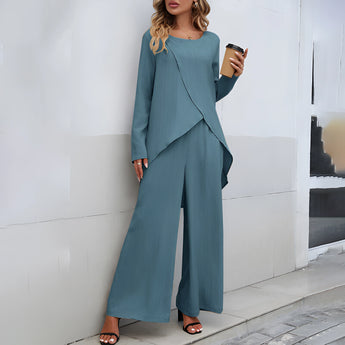 Asymmetric beige pantsuit featuring a casual yet elegant design for women, with a distinctive one-piece silhouette, long sleeves, and a structured collar.
