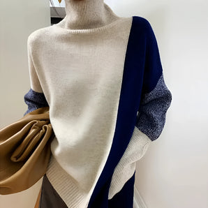 Asymmetric two-tone turtleneck sweater in blue and grey, featuring ribbed cuffs and a unique design suitable for one size fits all.