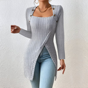 Asymmetrical gray ribbed top with button-detail long sleeves, displayed on a mannequin, showcasing its unique neckline and fitted waist.