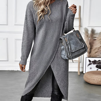 Asymmetrical grey ribbed turtleneck sweater dress featuring a fitted design with long sleeves, knee-length hem, and a cozy winter fashion aesthetic.