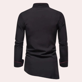 Black asymmetric slim fit men's shirt displayed on a mannequin with long sleeves, showcasing a modern avant-garde design with unique tailoring and stylish fit.