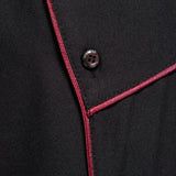 A stylish men's black asymmetric slim fit shirt featuring a unique design with an asymmetric cut and a modern collar, highlighting its contemporary avant-garde fashion style.