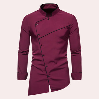 A stylish men's shirt in wine red with an asymmetric design, featuring a slim fit with long sleeves, a collar, and button details.