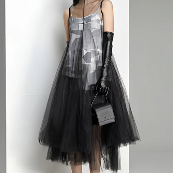 Avant-garde black plaid tulle midi dress featuring a unique fashion design with a knee-length cut, long sleeves, and a fitted waist for an edgy and stylish look.