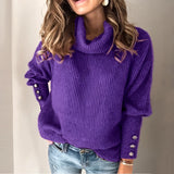 
Woman wearing a purple balloon sleeve turtleneck sweater paired with jeans.