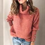 A red turtleneck sweater with balloon sleeves for women, styled with a chic knit fabric, paired with blue jeans.