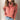 A red turtleneck sweater with balloon sleeves for women, styled with a chic knit fabric, paired with blue jeans.