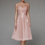 Elegant backless white sequin Art Deco evening gown in XL size, featuring a rose hue, showcasing a sleek one-piece design with intricate detailing on the shoulders and neckline.